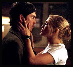 JIM CAVIEZEL and JENNIFER LOPEZ in ANGEL EYES  ©warner bros. all rights reserved